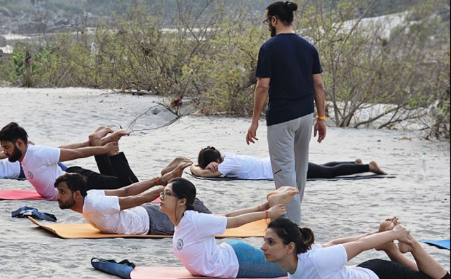 Beach yoga at rishikesh-yog-retreats 